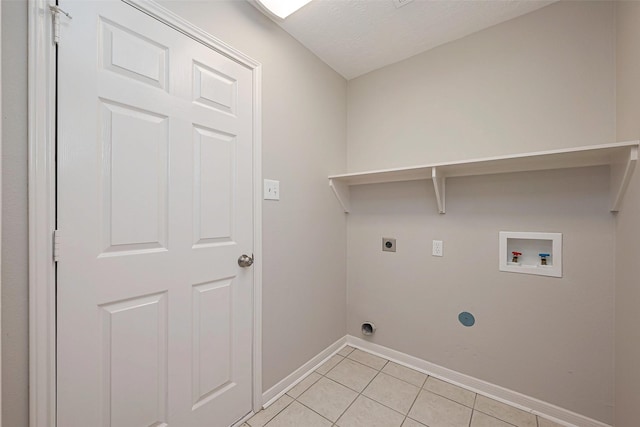 laundry area with washer hookup, light tile patterned floors, hookup for an electric dryer, laundry area, and baseboards