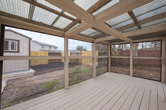 wooden terrace featuring a fenced backyard