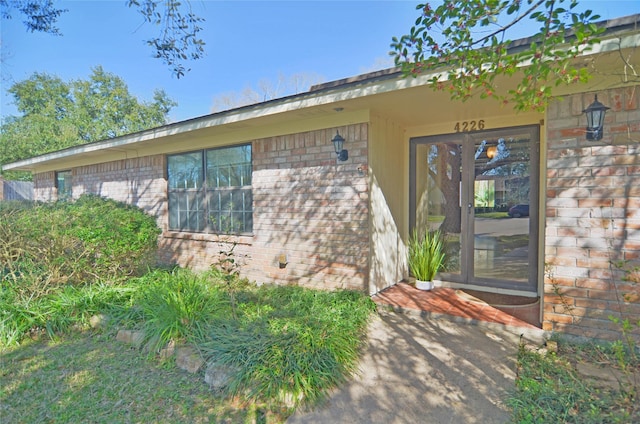 4226 Manorfield Dr, Seabrook, TX 77586 - property entrance with brick siding