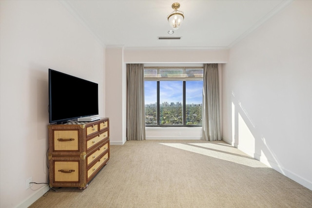 living area featuring baseboards, carpet flooring, visible vents, and crown molding