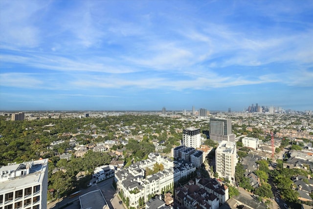 birds eye view of property with a city view