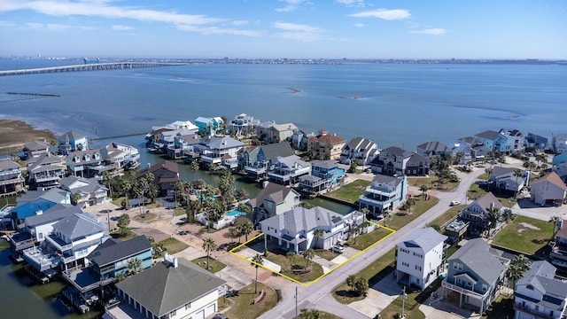 aerial view with a residential view and a water view