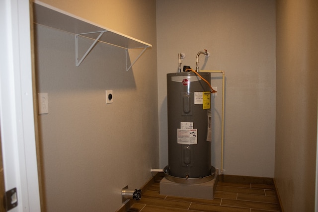 utility room with water heater