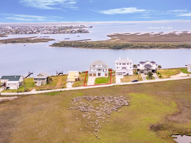 birds eye view of property featuring a water view and a residential view