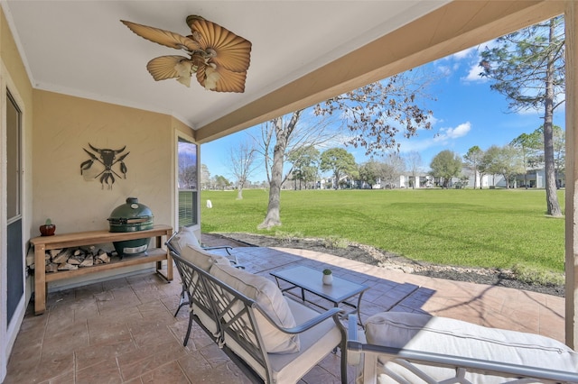 view of patio with ceiling fan