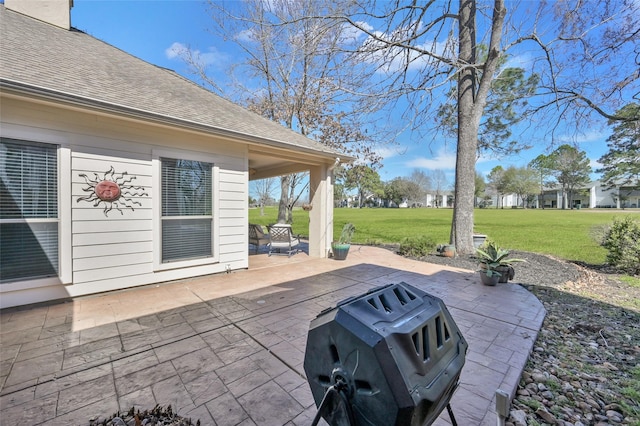 view of patio with a grill