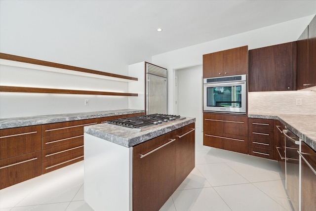 kitchen featuring stainless steel appliances, light tile patterned floors, open shelves, and modern cabinets