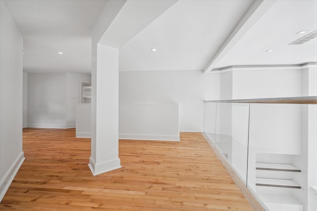 interior space featuring light wood finished floors, recessed lighting, and baseboards