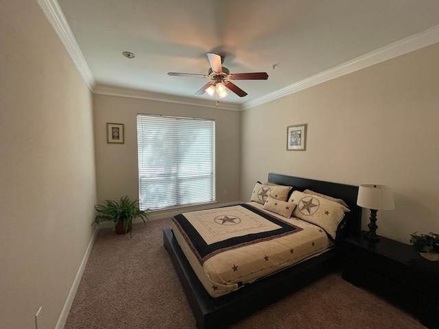 bedroom featuring baseboards, dark colored carpet, a ceiling fan, and crown molding