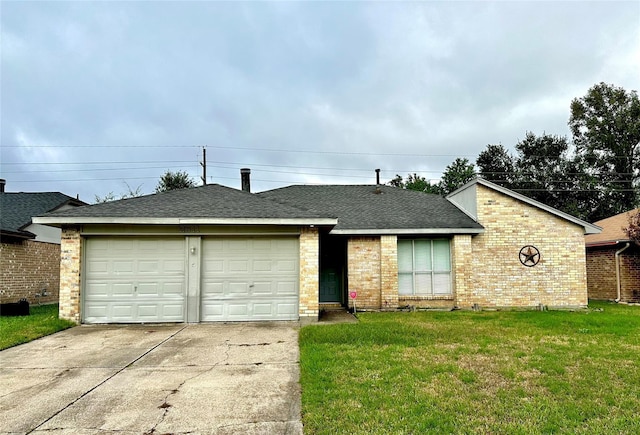 single story home with a garage, a shingled roof, a front lawn, and concrete driveway