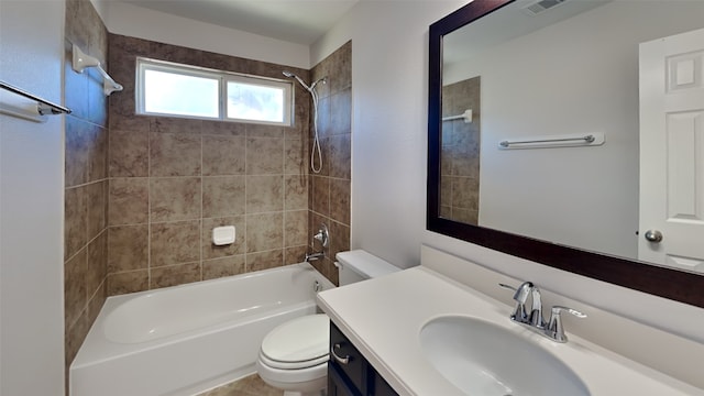 full bathroom with visible vents, shower / washtub combination, vanity, and toilet