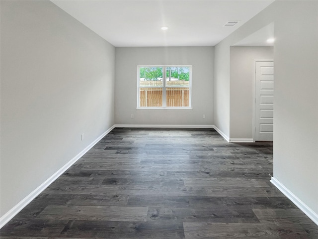 27407 Axis Deer Trl, Magnolia, TX 77354 - interior space with dark wood-type flooring, visible vents, and baseboards