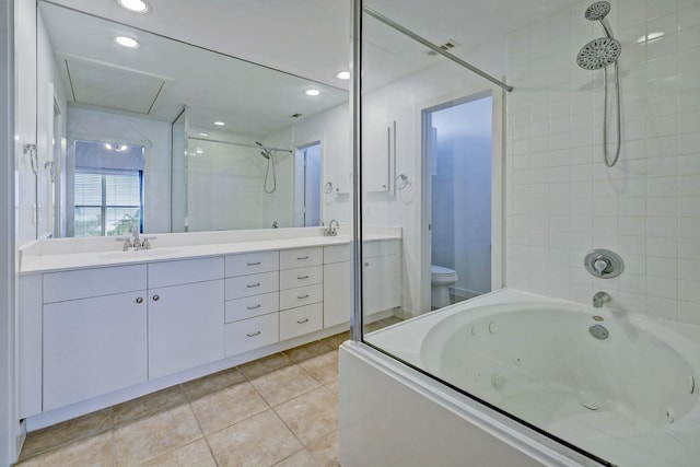 full bathroom with tile patterned flooring, a sink, toilet, and double vanity