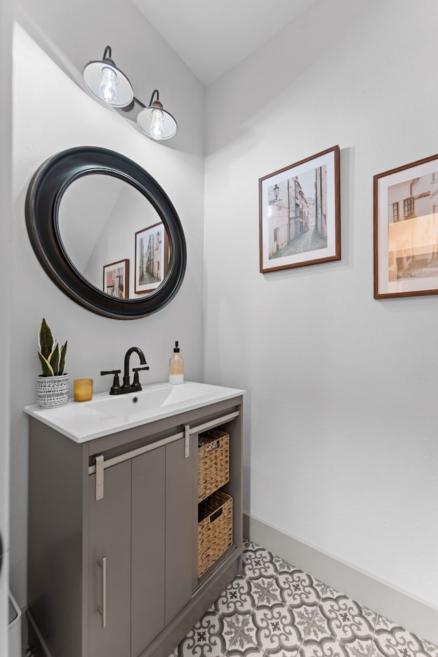 bathroom featuring vanity and baseboards