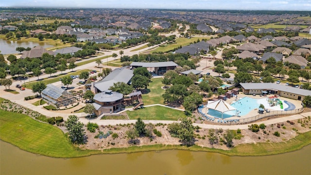 aerial view with a water view and a residential view