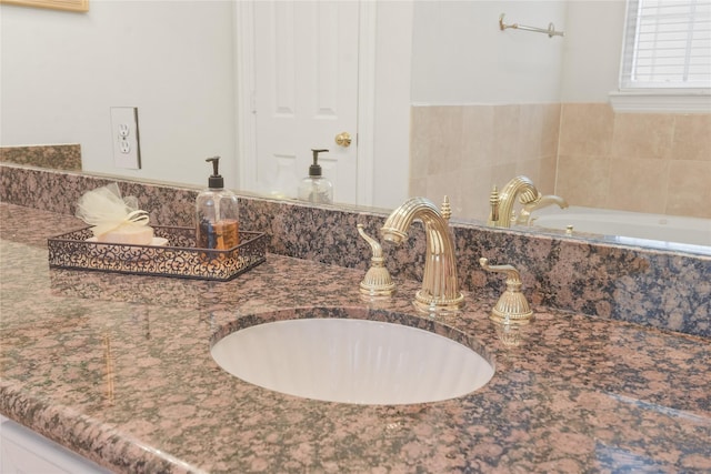 room details featuring double vanity, indoor wet bar, and a sink