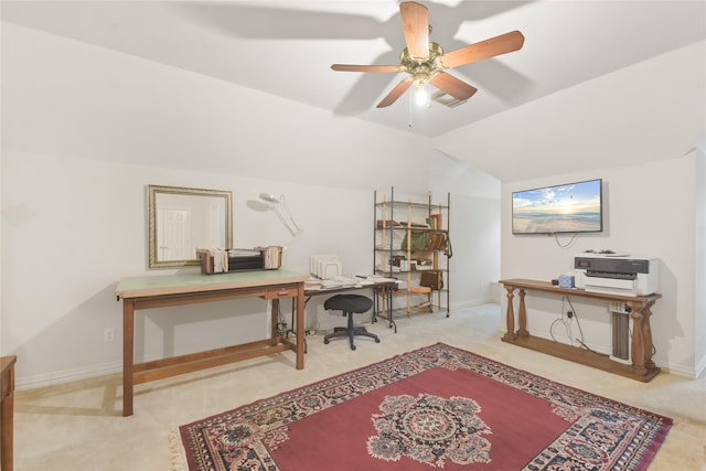 office area with lofted ceiling, carpet, ceiling fan, and baseboards