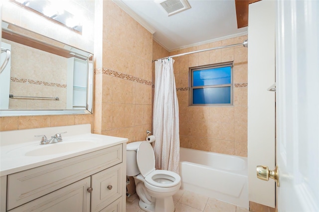 full bathroom featuring shower / bath combo, visible vents, toilet, tile patterned floors, and tile walls