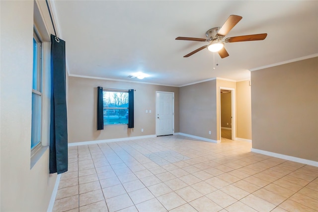 unfurnished room with light tile patterned flooring, crown molding, baseboards, and ceiling fan