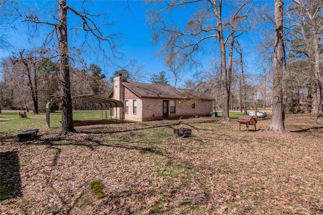 2 Brown Rd, Huntsville, TX 77320 - view of yard with a detached carport