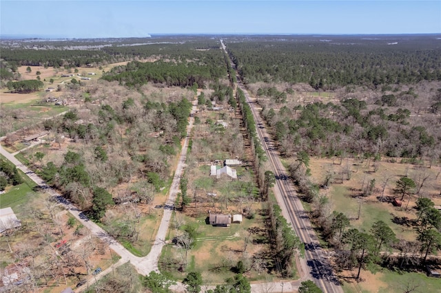 2 Brown Rd, Huntsville, TX 77320 - birds eye view of property featuring a forest view and a rural view