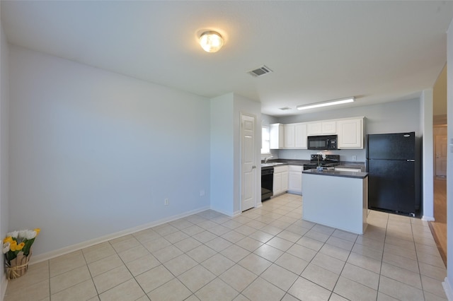 kitchen with visible vents, baseboards, white cabinets, black appliances, and dark countertops