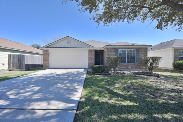 ranch-style home with an attached garage, a front lawn, concrete driveway, and brick siding