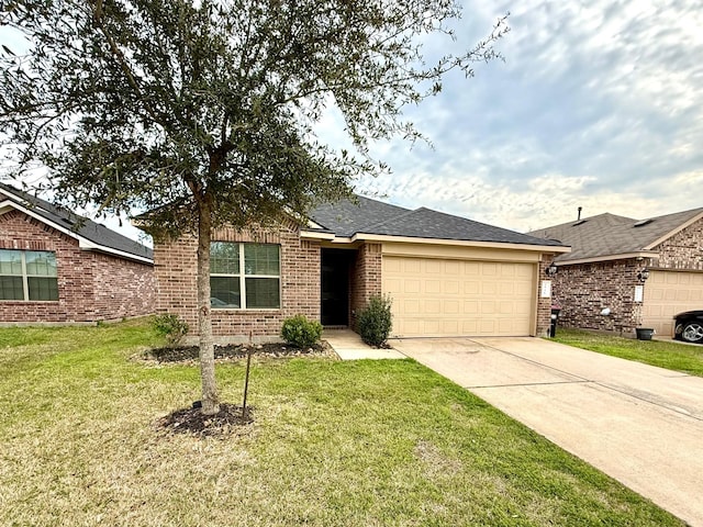 ranch-style home with brick siding, a shingled roof, a front yard, a garage, and driveway