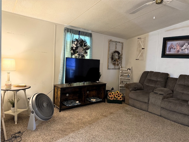 carpeted living area with ceiling fan, vaulted ceiling, and a textured ceiling