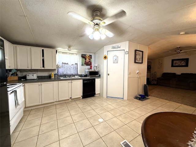 kitchen with ceiling fan, white electric stove, a sink, vaulted ceiling, and dishwasher