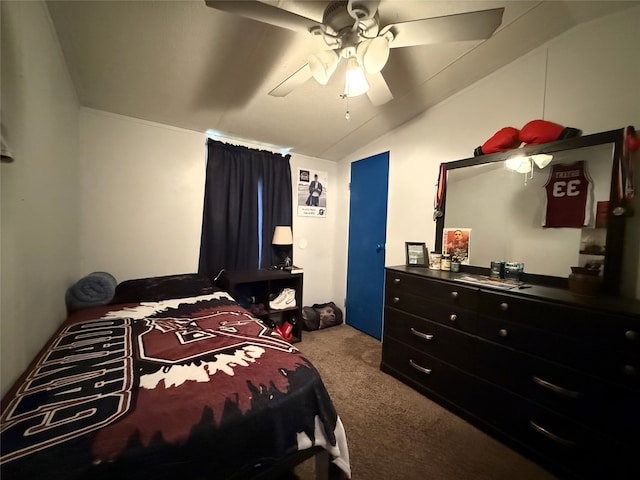 bedroom featuring carpet floors, vaulted ceiling, and ceiling fan