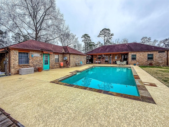 pool with a patio