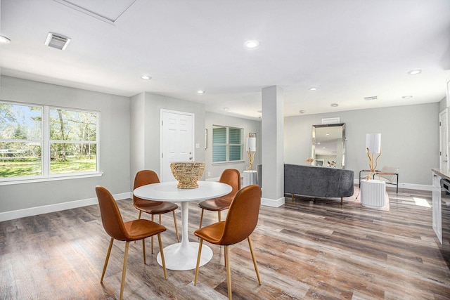 dining area with visible vents, recessed lighting, baseboards, and wood finished floors