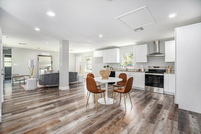 dining area with recessed lighting, visible vents, and dark wood-type flooring