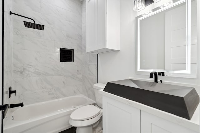 full bathroom featuring shower / bathing tub combination, vanity, and toilet