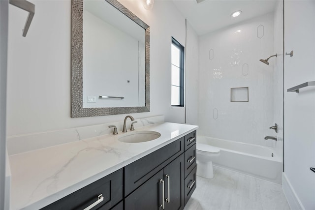 full bathroom featuring toilet, tile patterned flooring, washtub / shower combination, and vanity