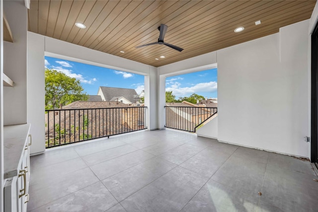 view of patio / terrace featuring ceiling fan and a balcony