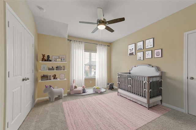 24030 Tirso River Ct, Katy, TX 77493 - carpeted bedroom with a nursery area, a closet, baseboards, and ceiling fan