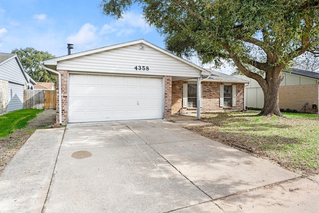 ranch-style house with a garage, driveway, brick siding, and fence