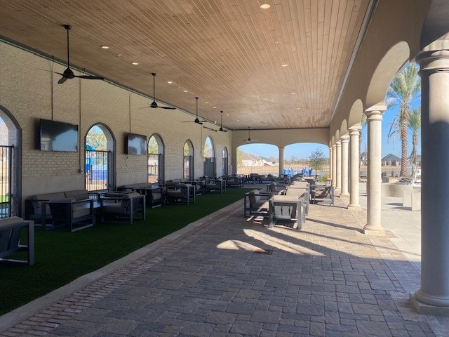 view of patio with a ceiling fan