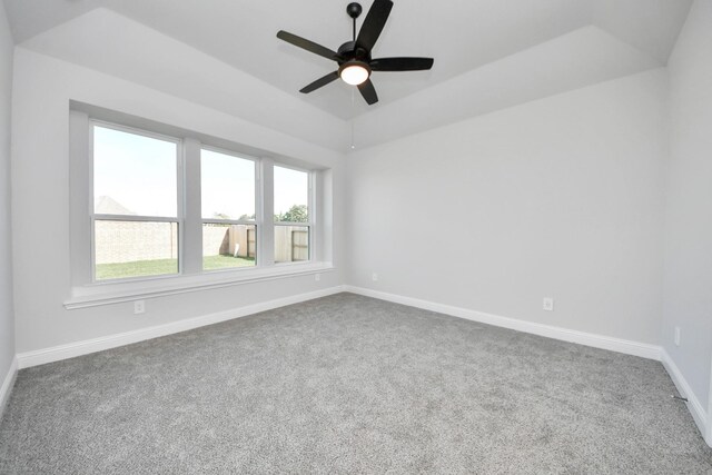 21311 Bridle Rose Trl, Tomball, TX 77377 - unfurnished room with baseboards, a ceiling fan, dark colored carpet, and lofted ceiling