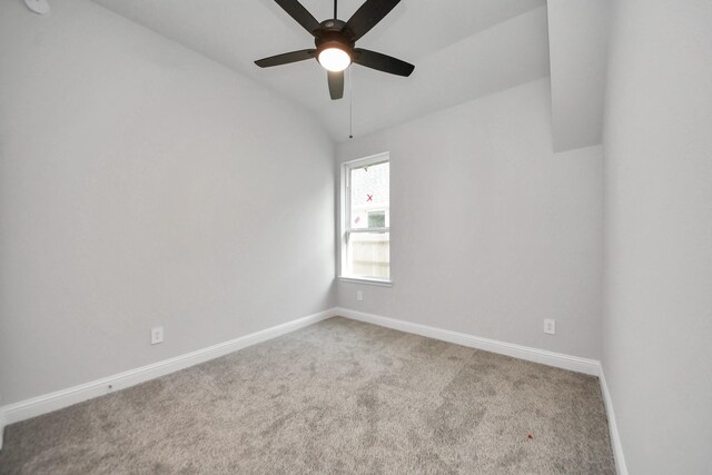 21311 Bridle Rose Trl, Tomball, TX 77377 - unfurnished room featuring baseboards, a ceiling fan, vaulted ceiling, and carpet floors