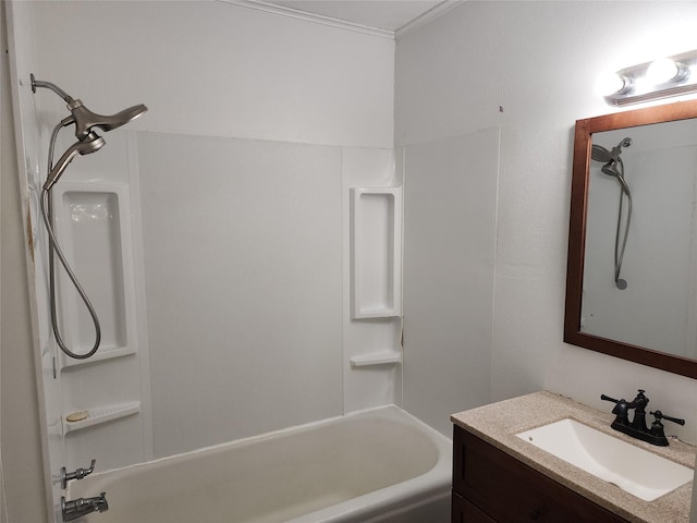 bathroom featuring washtub / shower combination and vanity