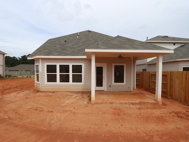9738 Fuller Frk, Montgomery, TX 77316 - rear view of house featuring a ceiling fan, a patio, and a shingled roof