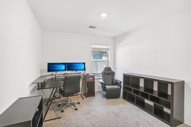 office area with carpet floors and visible vents