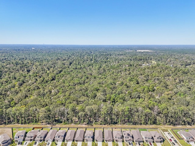 bird's eye view with a residential view and a view of trees