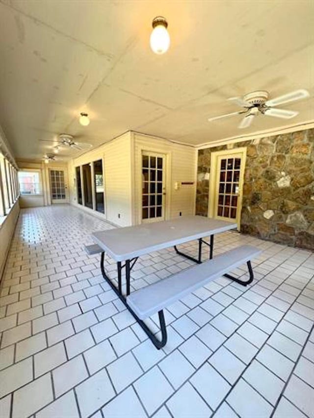 view of patio featuring a ceiling fan