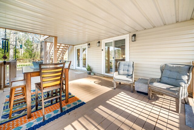 653 Terrace Trl, Goodrich, TX 77335 - wooden deck with french doors