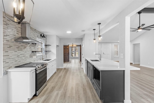 25511 Long Hill Ln, Spring, TX 77373 - kitchen with wall chimney exhaust hood, a sink, backsplash, and appliances with stainless steel finishes