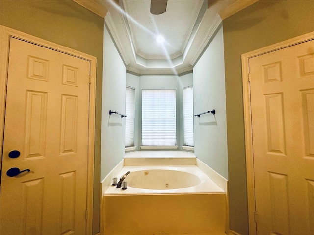 full bathroom featuring a tub with jets and ornamental molding